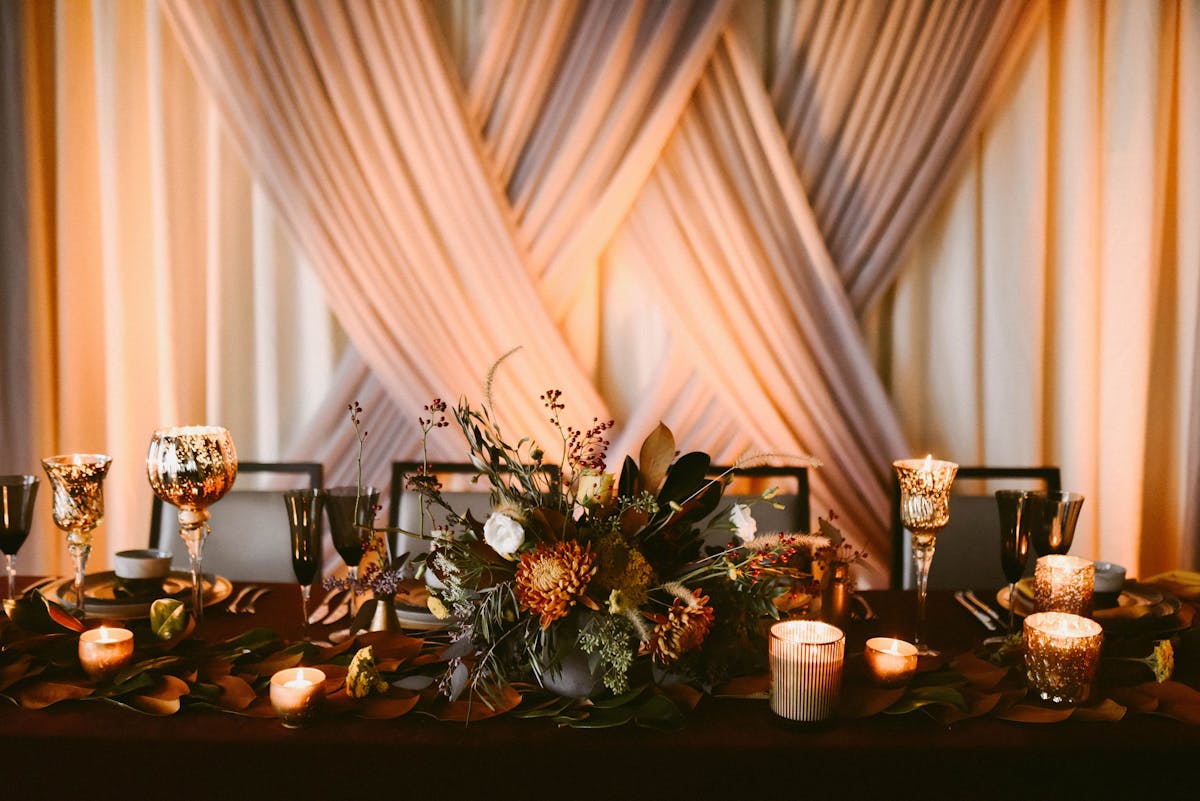 a vase of flowers on a table